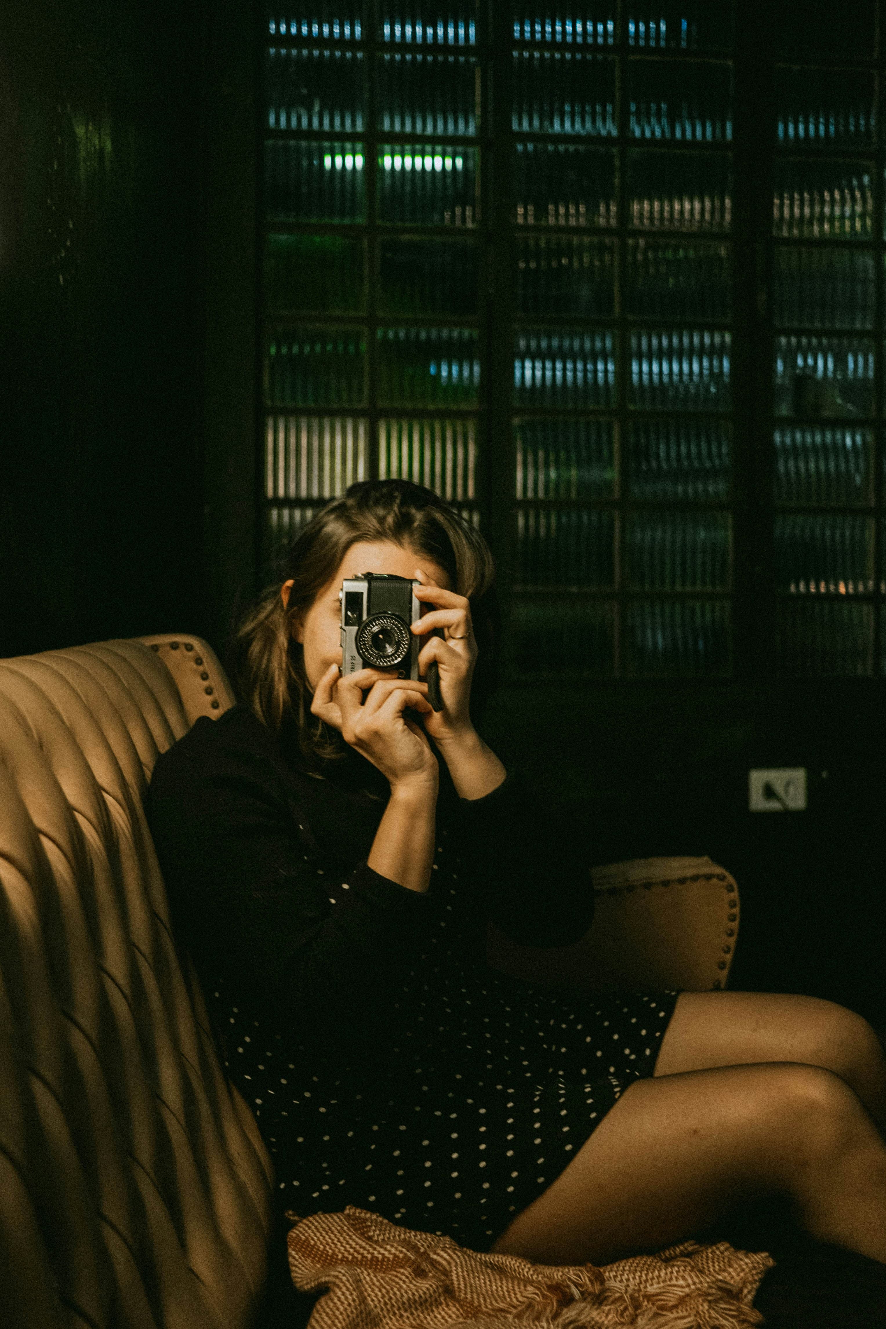 A photographer pausing to frame a shot
